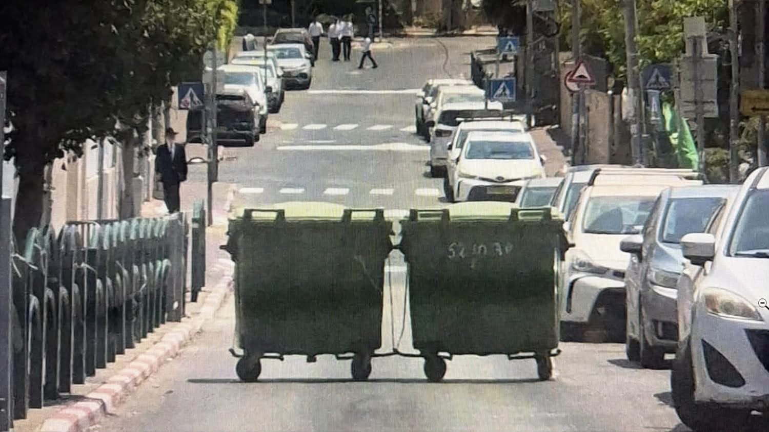 Rehovot Residents Block Street on Shabbat With Trash Bins, Sparking Municipal Response