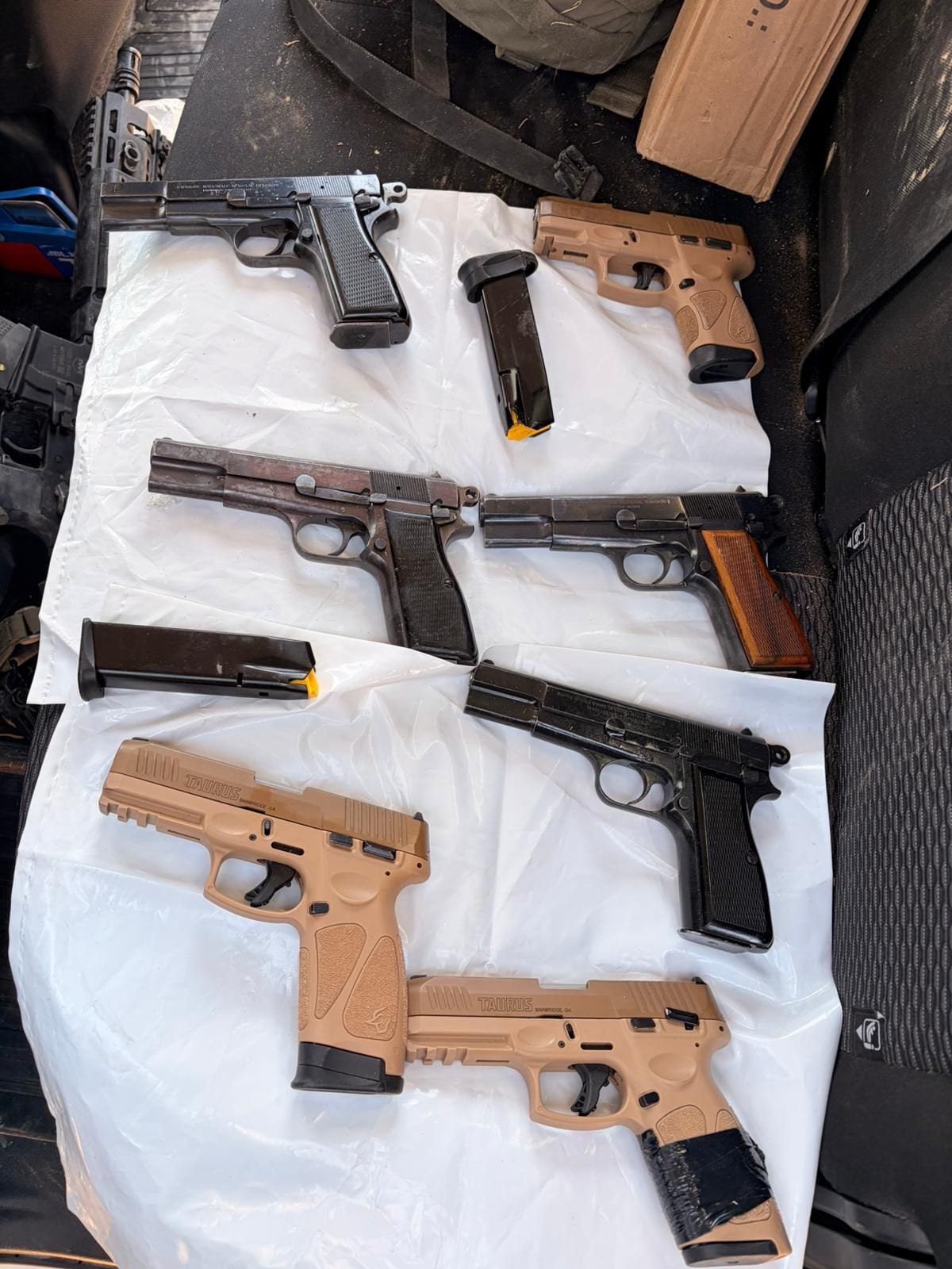 Seven Handguns Seized at Jordan Valley Border After Suspect Shot and Escaped
