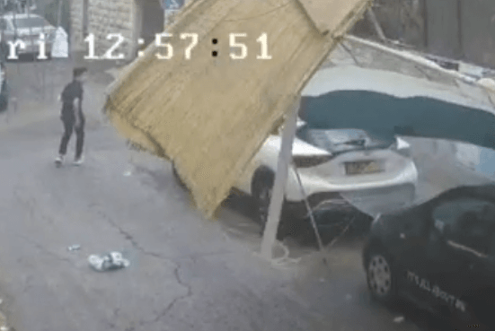 Sukkah Plummets From Balcony Onto Street – Pedestrian Escapes Seconds Before Impact