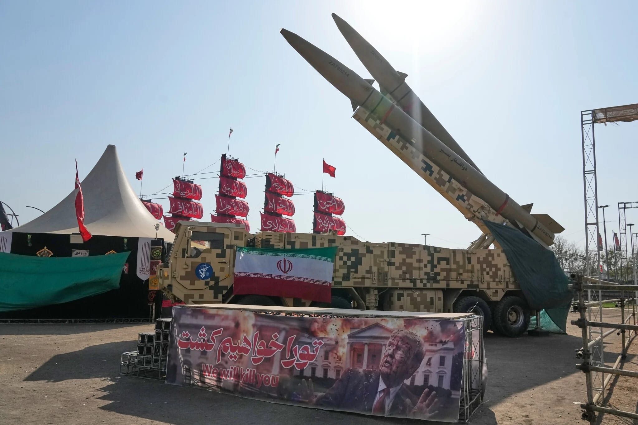 Iran vows to take preemptive action against threats, as it touts improved ballistic missile