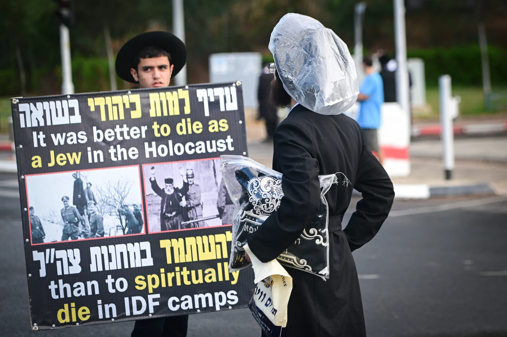 Haredi anti-draft protesters block roads at IDF induction center for second day