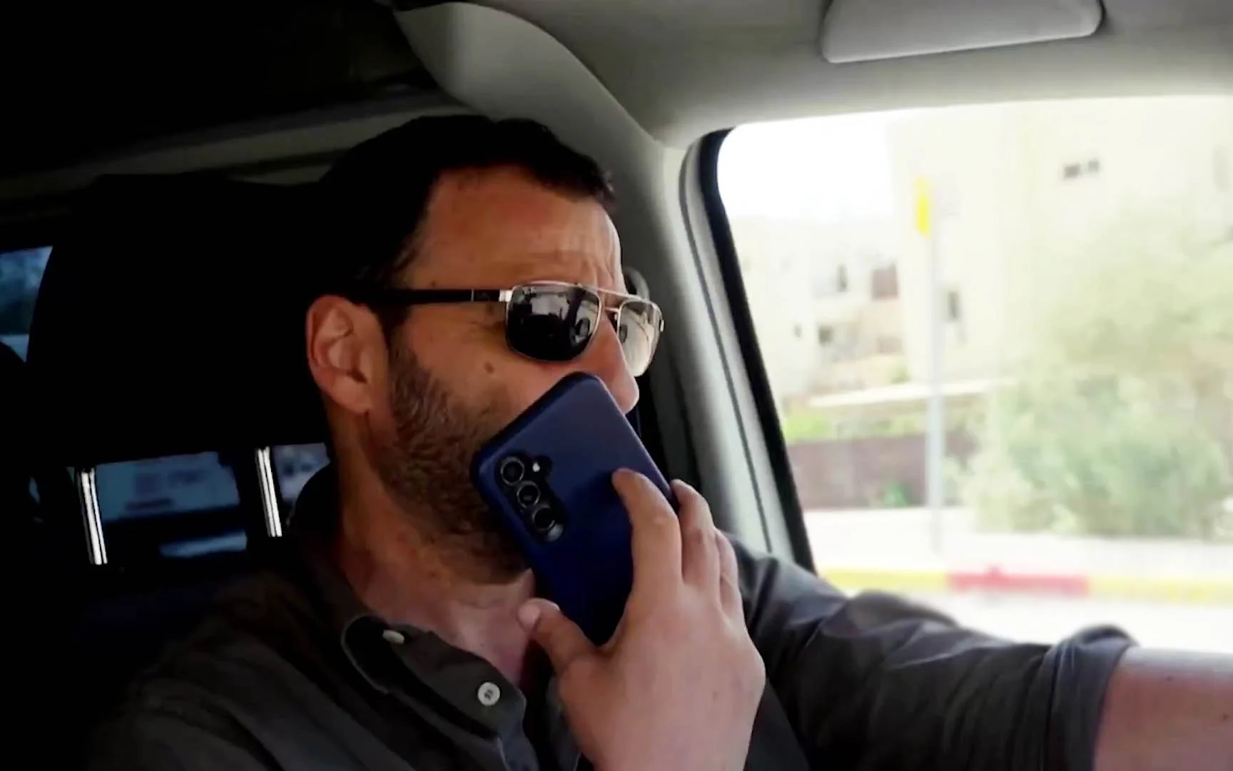 At behest of Likud lawyer, police probe journalist for talking on phone while driving in TV segment