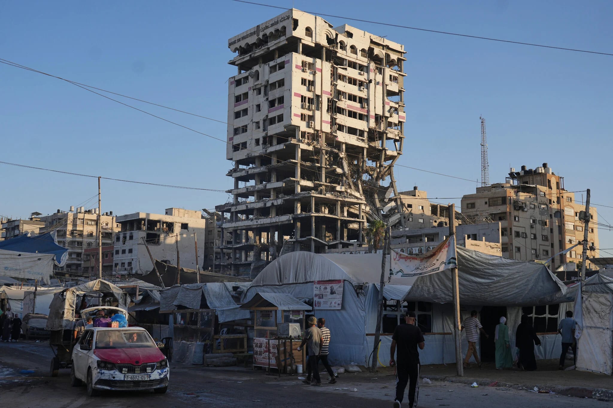 Fatal building collapse highlights dangers plaguing Gaza nearly a year after ceasefire
