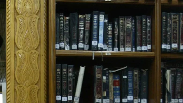 Woman steals holy books from gravesite and sets them on fire