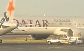Jetstar and Qatar Airways Aircraft Narrowly Avoid Collision at Sydney Airport; Crew Member Injured