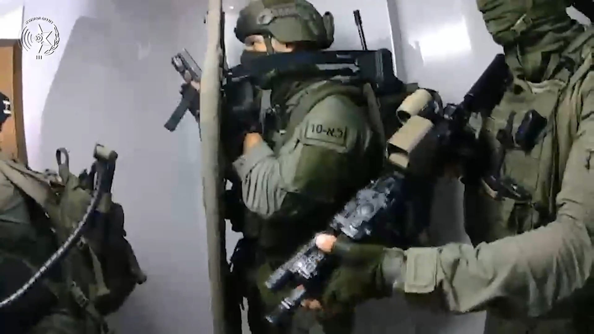 Hamas Flags in Living Room, Weapons Hidden Inside Tree Trunk