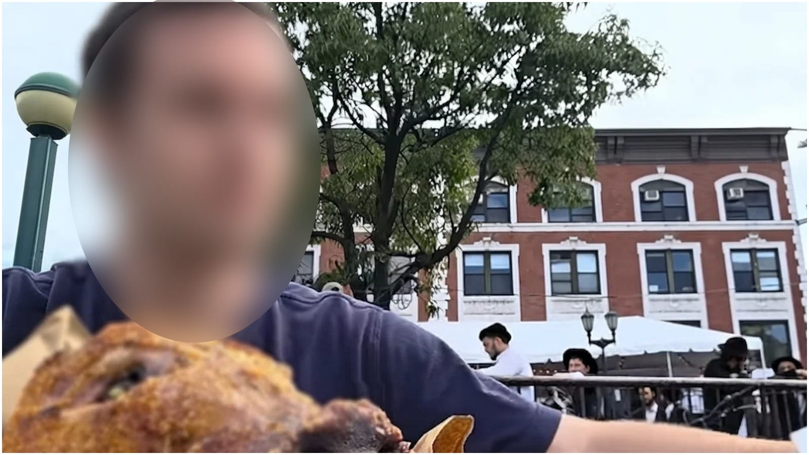 Man Eats Pork Outside 770 on Yom Kippur in Shocking Provocation
