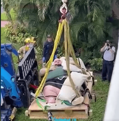 Firefighters Break Through Wall to Rescue 600-Pound Man from Second-Floor Apartment