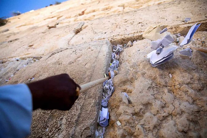 Slips of Paper, Layers of Tradition Between the Stones: The History of Prayer Notes in the Western Wall