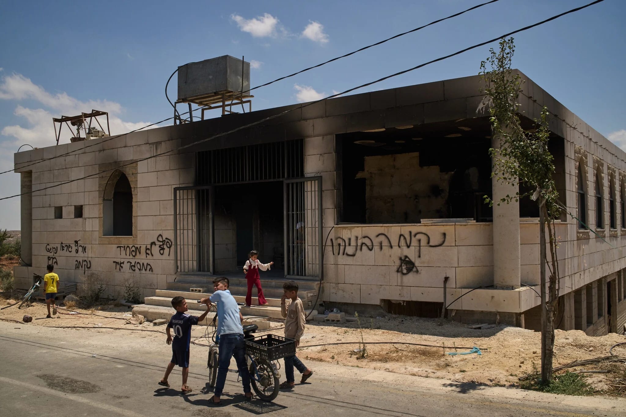 West Bank mosque said torched by settlers; 8 arrested for assaults on Palestinians, mosque arsons