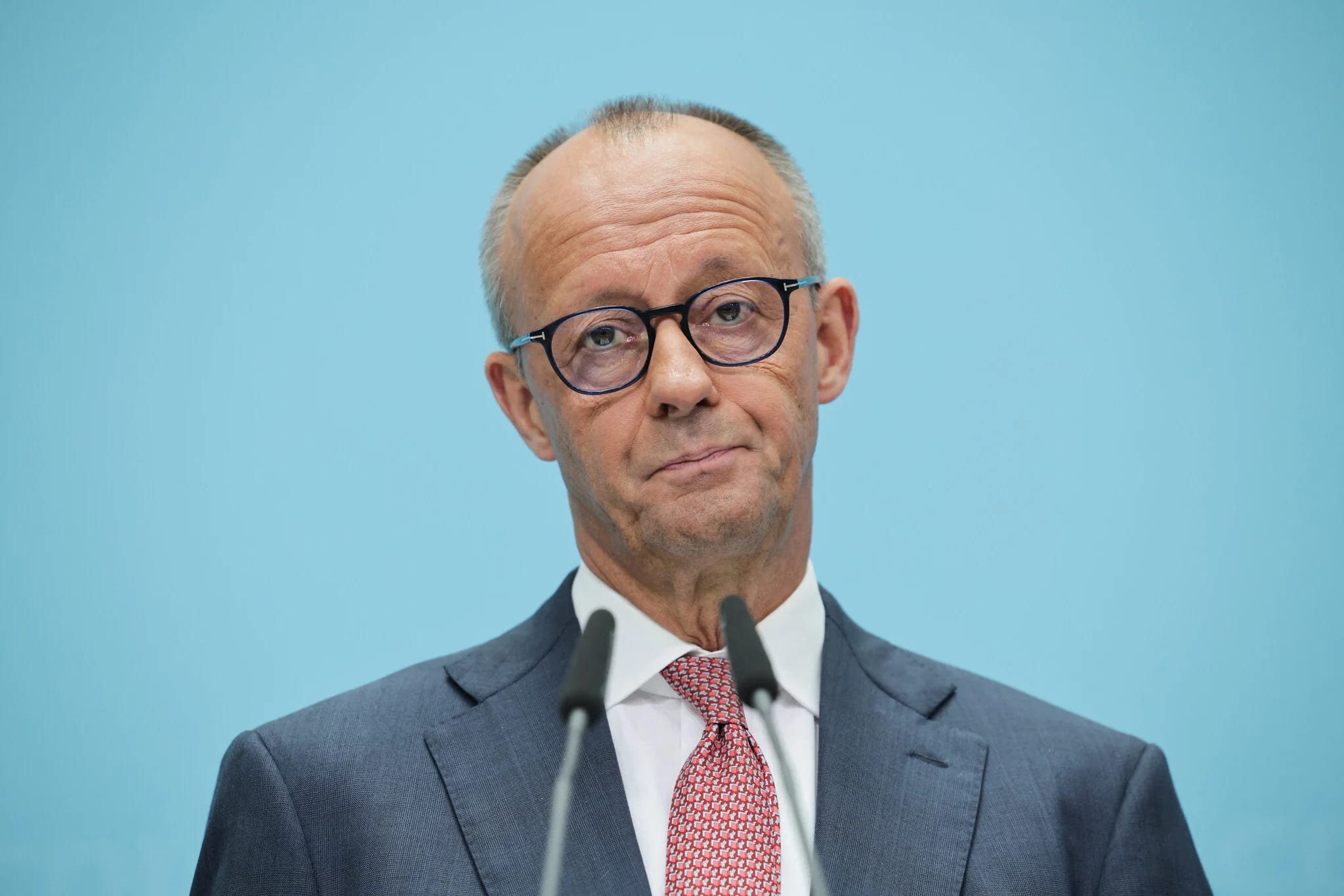 Germany’s ‘democratic future’ at stake: Merz clings on after huge defeats in 2 state elections