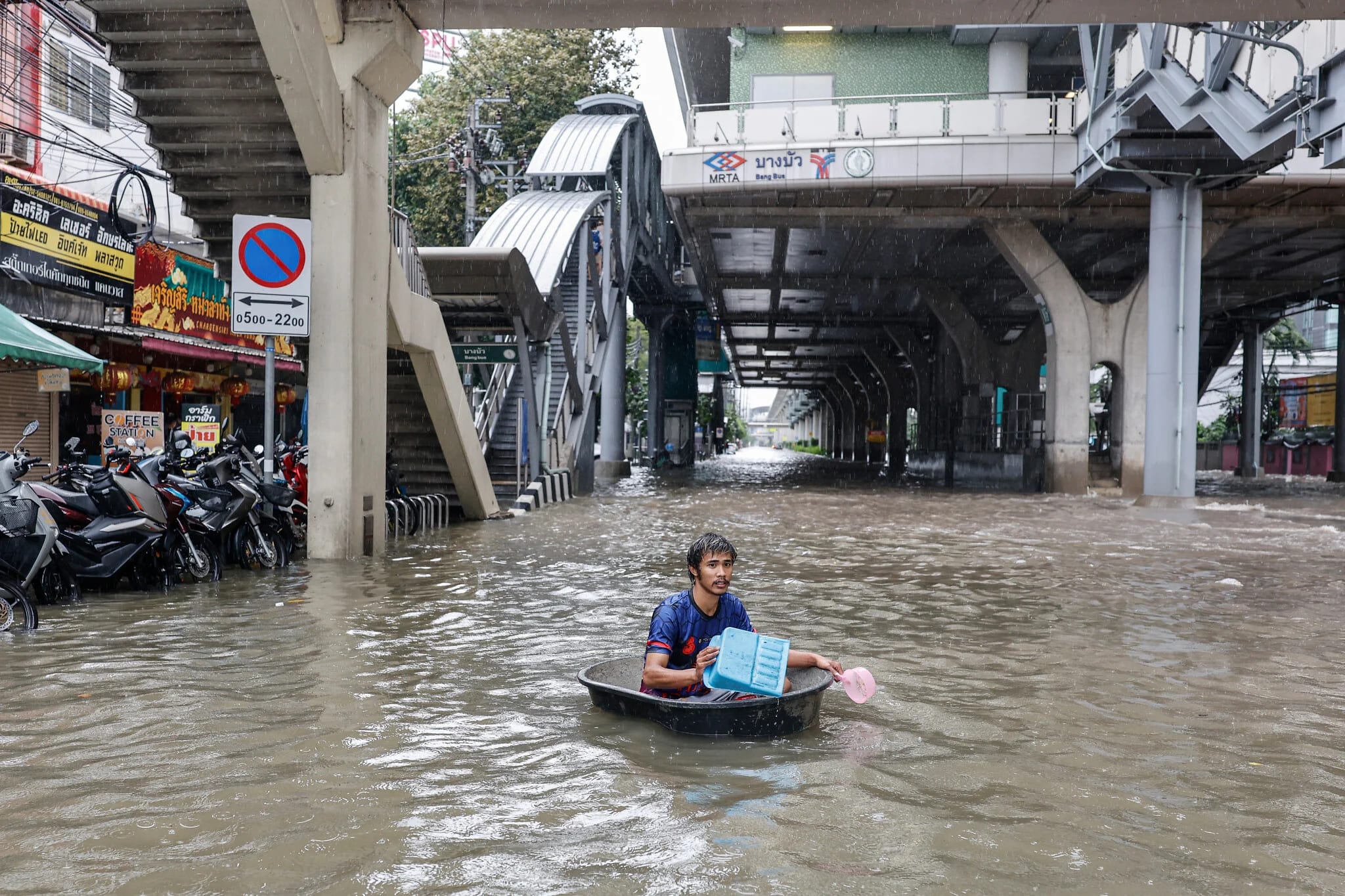 Canals full, roads underwater as Bangkok declares flood disaster amid torrential rains