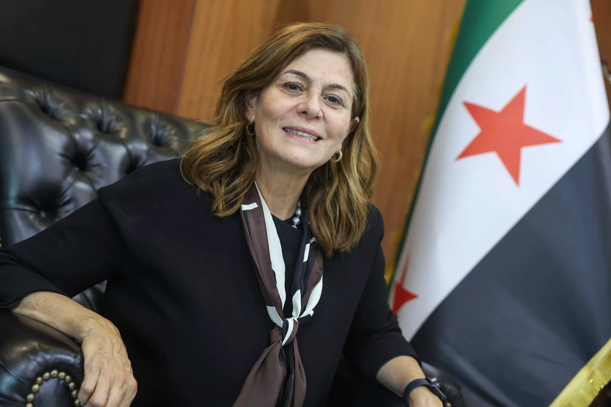Syrian social affairs minister, a Christian woman, urges equality in constitution
