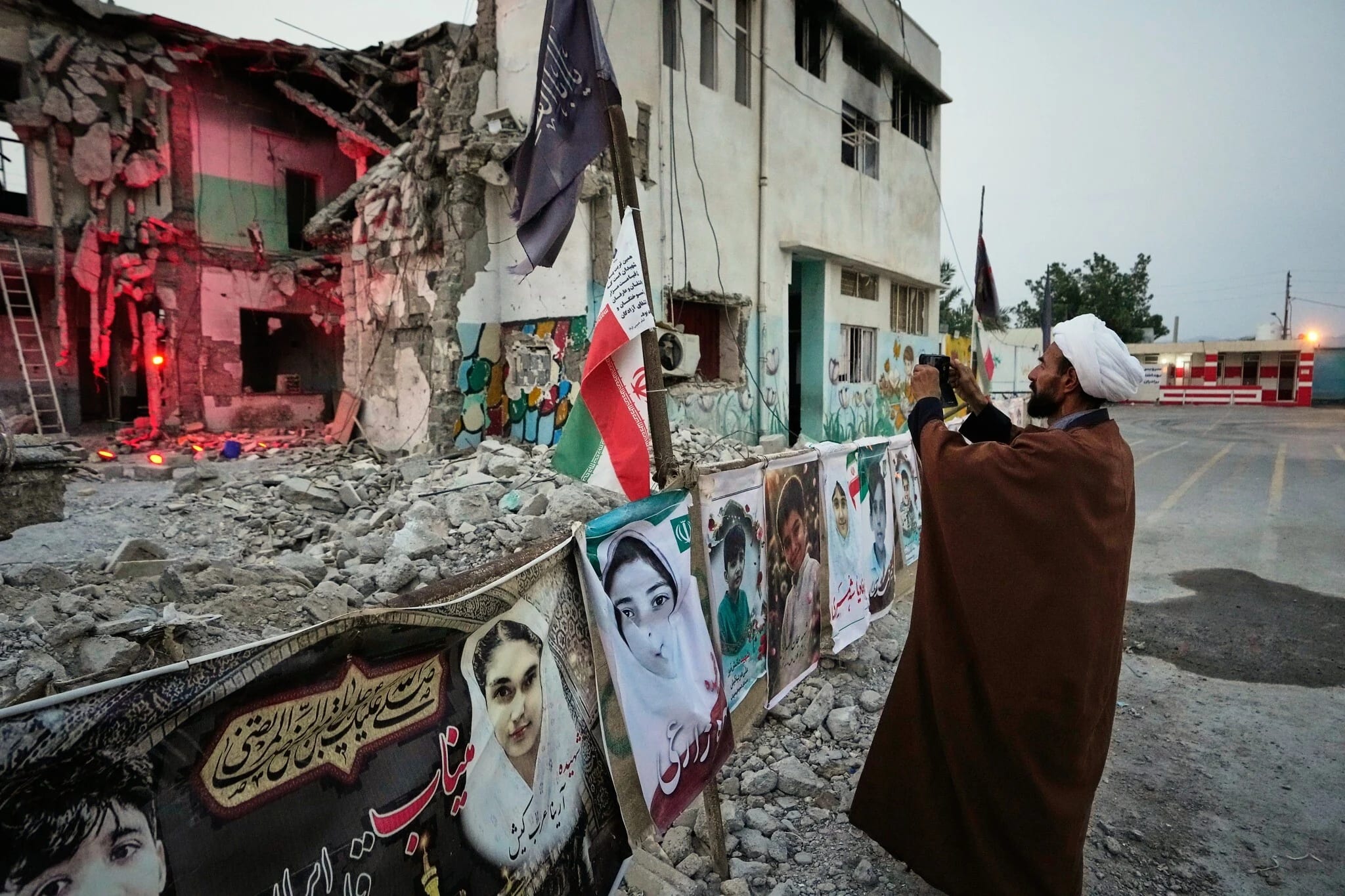 Families grieve in ruins of Iranian school where US strike killed dozens of children