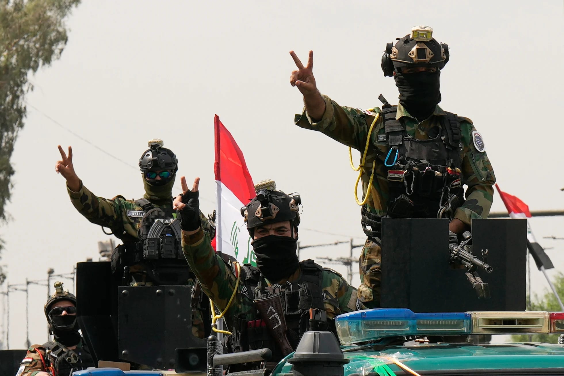 Iraqis celebrate US troops withdrawal as government takes charge of security