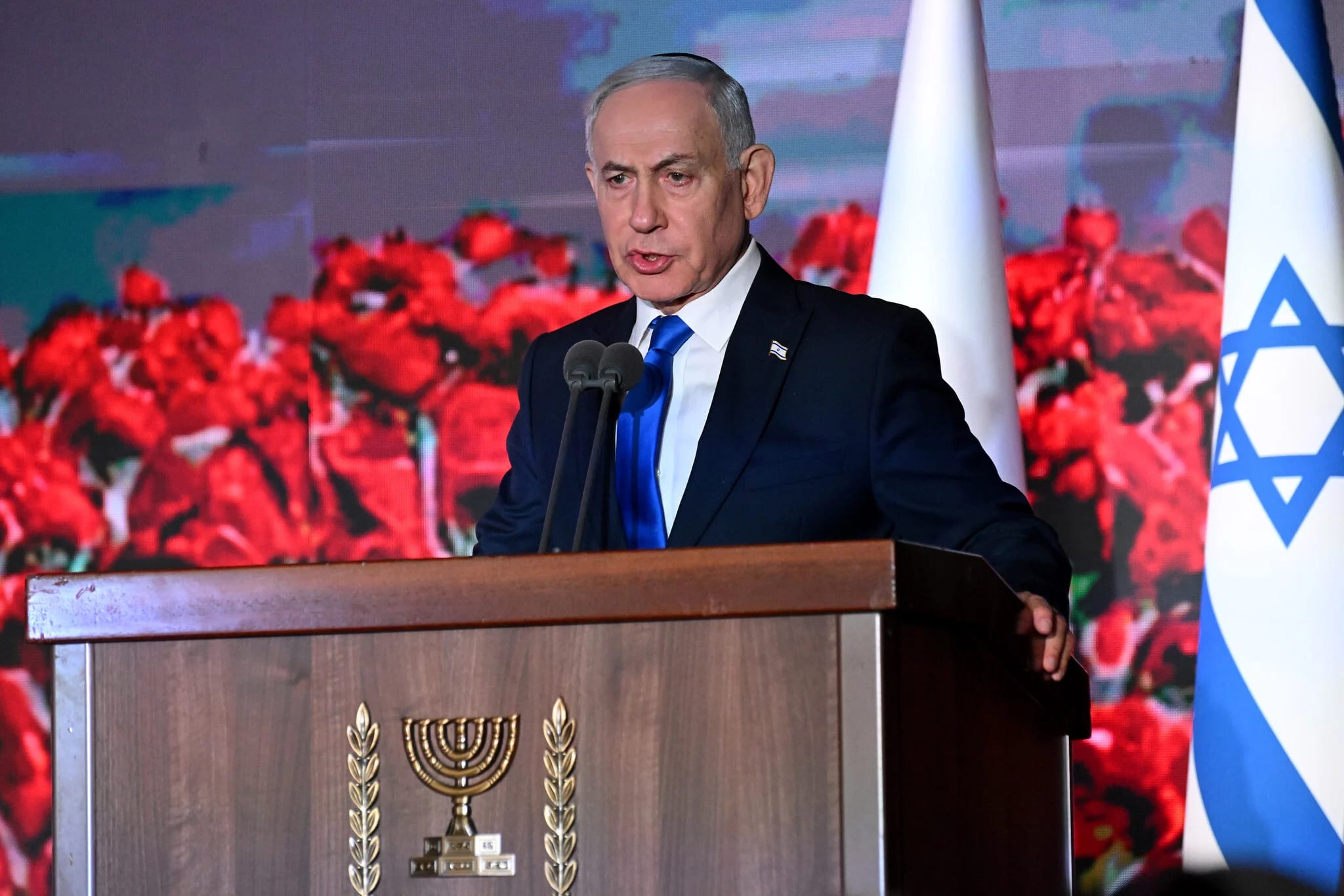 At Oct. 7 ceremonies, PM vows to settle scores. Others urge accountability for massacre