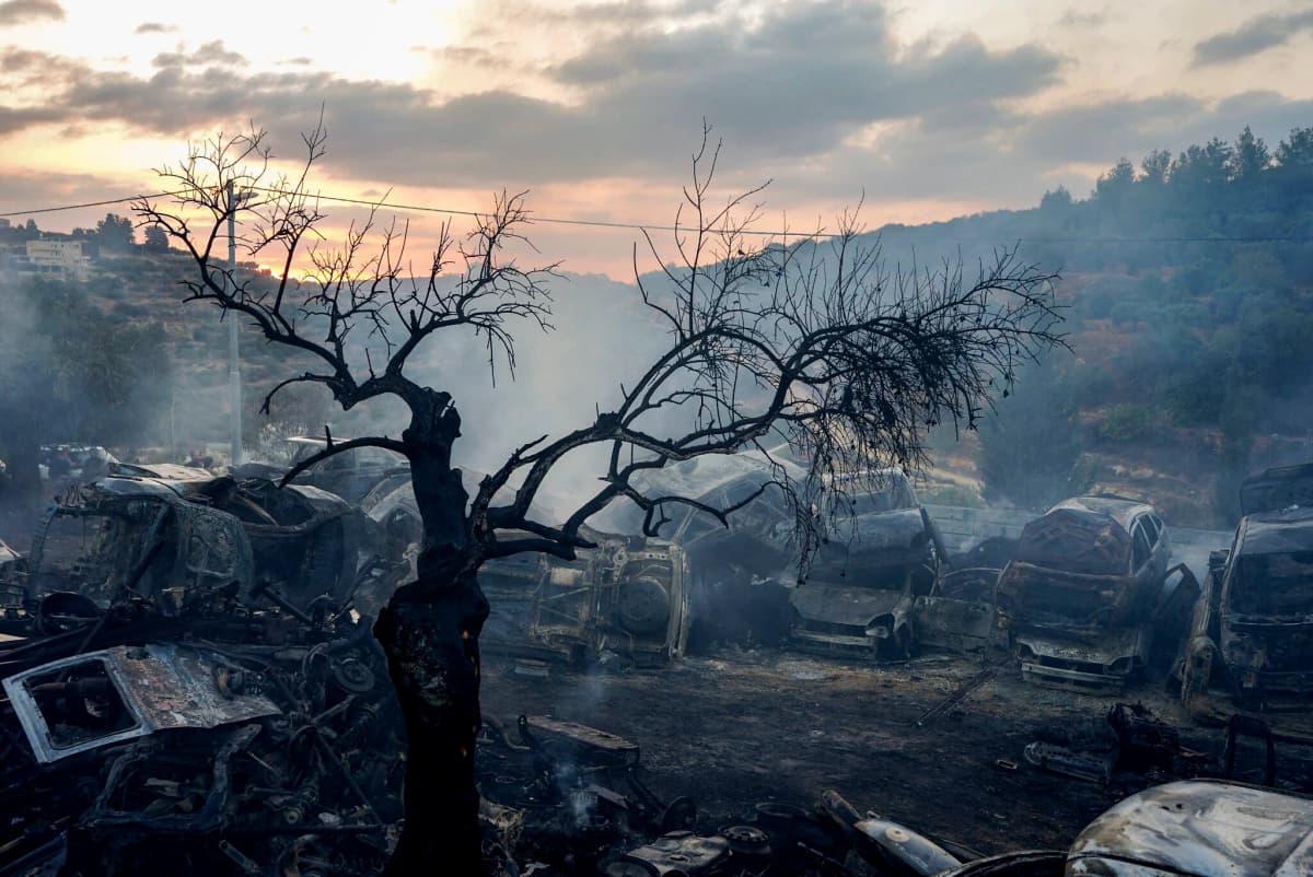 IDF says settlers raid Palestinian village, vandalize building and set fire to shed