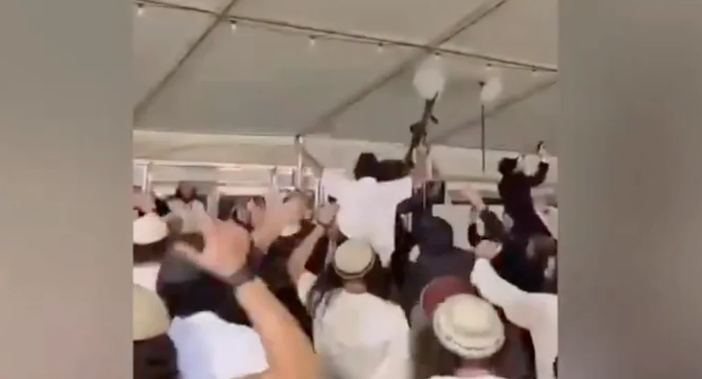 Rifle-wielding settler extremists filmed dancing at wedding to anti-Zionist anthem