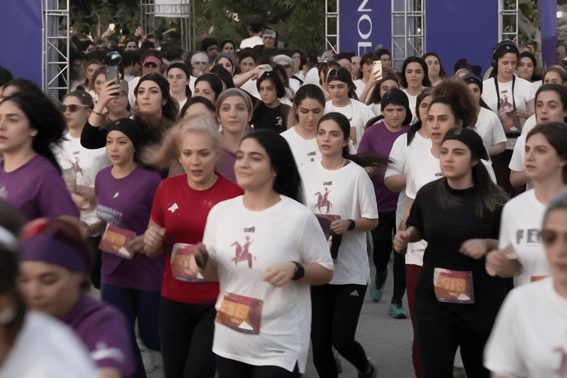 Women Run Without Hijabs in Tehran as 300,000 Attend State-Organized Rally
