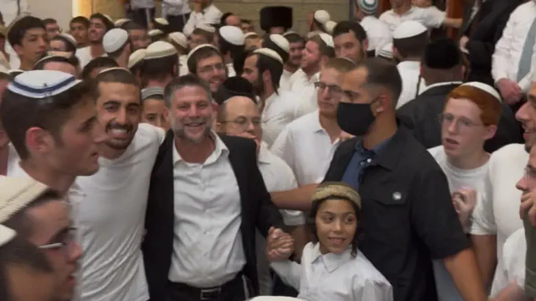 Watch: Wounded in Jabaliya, IDF soldier dances with Smotrich at Simchat Beit Hashoeva