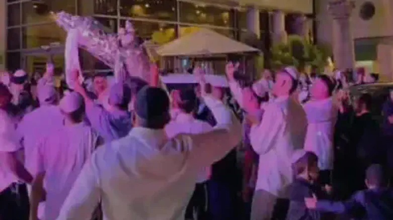Three years later: Nova massacre survivors dance with Torah scrolls