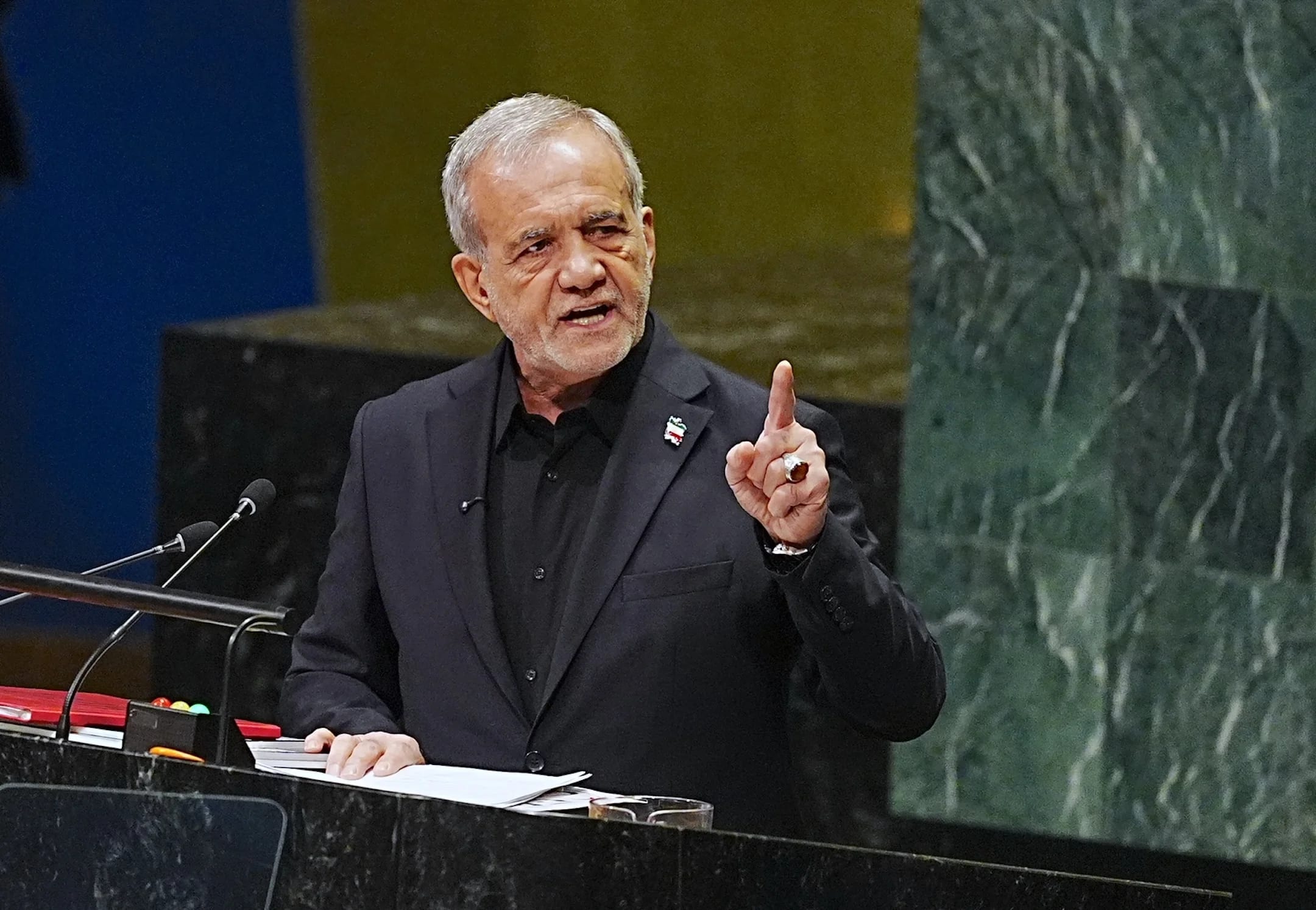 Iran won’t bow to military action or sanctions and will retain nuclear program, country’s president tells UNGA