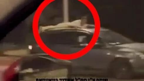 תיעוד מטריד מאשדוד: בן 17 נוהג בפראות - כשאדם שכוב על גג רכבו | צפו